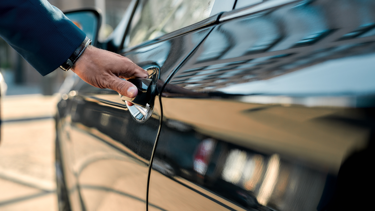 a man opening a car door