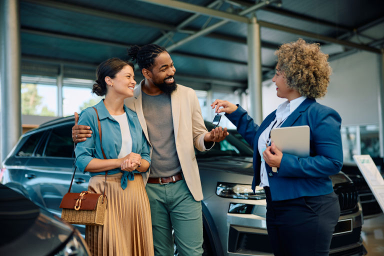 couple buying a car