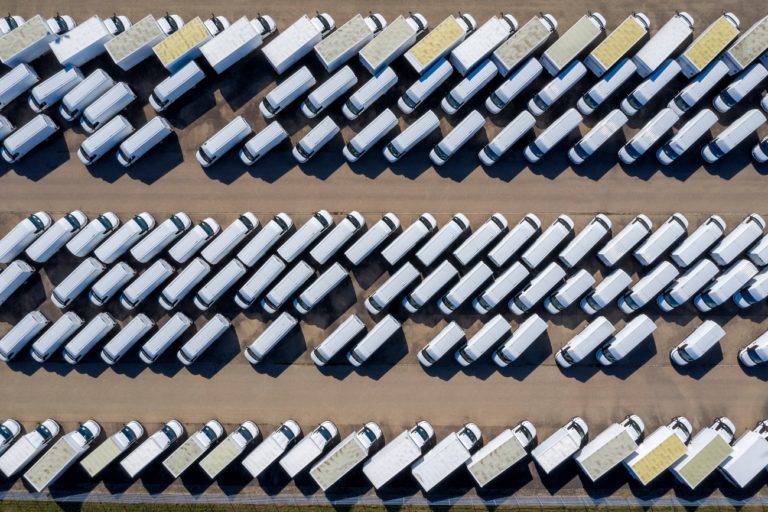 a group of white vans