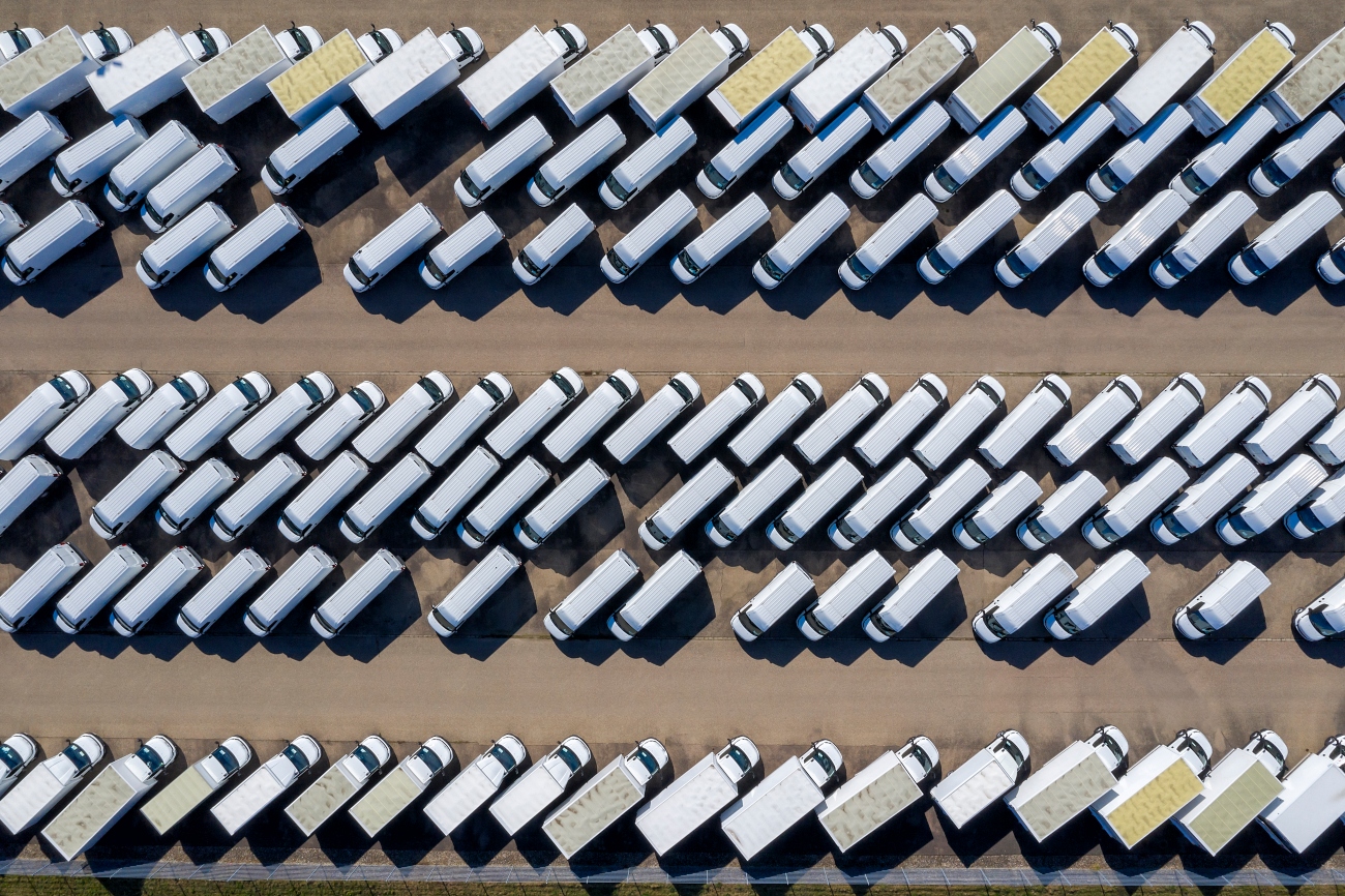 a group of white vans